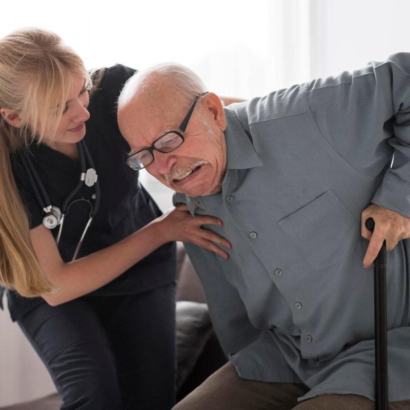 old-man-pain-helped-by-nurse_23-2148740036